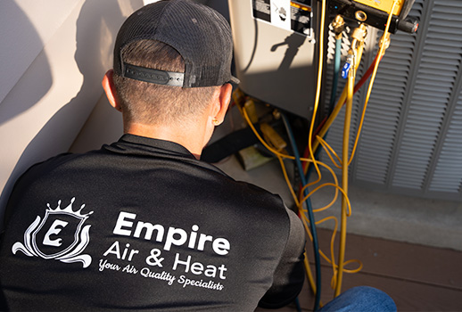 Empire Air and Heat working with back facing the camera